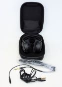 A pair of Beyerdynamic DT1990 Pro Studio Headphones in storage case (2 cables & spare earpads inc