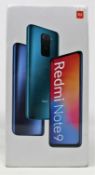 A boxed as new Xiaomi Redmi Note 9 128GB in Onyx Black (IMEI: 867678051853666) (Box sealed).