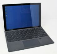 A pre-owned Microsoft Surface Pro 4 in silver with Intel i5-6300U 2.4GHz processor, 4GB RAM, 128GB