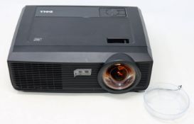 A pre-owned Dell S300wi DLP Short-Throw Projector (remote control, various as new cables, antenna,