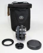 A pre-owned Fujifilm Fujinon GF 50mm f/3.5 R LM WR with a Tamrac lens bag.