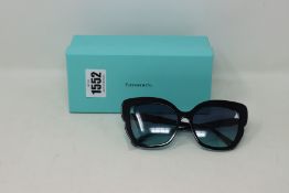A pair of boxed as new Tiffany & CO TF 4161 80559S - 56 sunglasses.