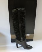 A pair of as new Saint Laurent Kim 90 boots in black (EU 35).