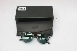 A pair of as new Persol PO2475S sunglasses.