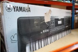 A boxed as new Yamaha PSR-EW410 digital keyboard.