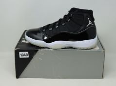 A pair of s new Nike Jordan 11 Retro (UK 11).
