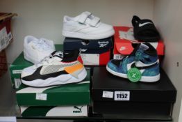 Seven pairs of infants trainers/footwear to include Nike Jordan 1 Retro High.