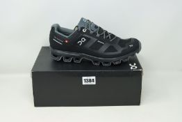 A pair of as new On Running Cloudventure waterproof trainers (UK 9).