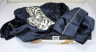 A pair of as new Olivia Von Halle silk pyjamas with tiger decoration on back (Size 2).