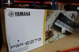 A boxed as new Yamaha PSR-E273 portable keyboard.