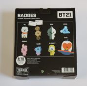 Two display boxes of BT21 BTS badges (12 packs per box) (One box has damage, one pack opened).