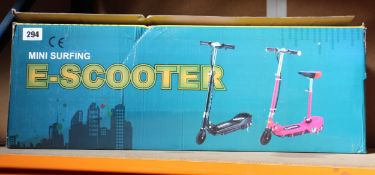 A boxed Mini Surfing E-Scooter.