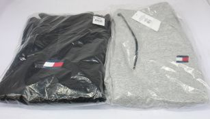 An as new Tommy Sports 1/2 zip fleece mid layer (M) an a pair of Tommy Sports cuffed regular