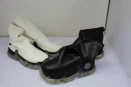 Two pairs of pre-owned SWEAR Positively Conscious trainers; Air Rev. Xtra vegan and one similar pair