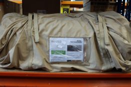 A Canvascamp Sibley 500 Pro Green tent.