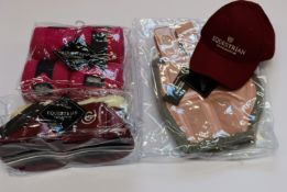 A quantity of as new Equestrian accessories to include; two brushing boots in pink, two Bordeaux