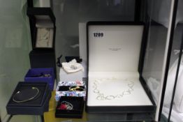 Seven boxed items of Jewellery to include Vivienne Westwood earrings, Daniel Wellington cuff bangle,