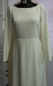 An as new Amy Kuschell bridal gown (Size 8).