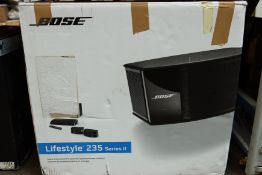 A pre-owned boxed Bose Lifestyle 235 home entertainment system. (Not original box).