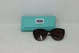 A pair of lady's boxed as new Tiffany & Co. sunglasses (0TF4166 81343B 55).