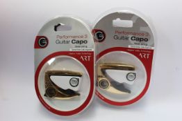 Three as new G7th Performance 3 Guitar Capos for steel strings (Special Edition Celtic Engraved).