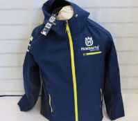 An as new 2020 Husqvarna replica team hardshell jacket (M - RRP £170).