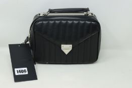 An as new The Kooples Barbara Metallasse bag (RRP €418).