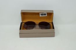 A pair of lady's boxed as new Bvlgari sunglasses (BV6106B 278/13 59).