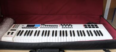 A pre-owned M-Audio Axiom Pro 61 keyboard in white (With bag).