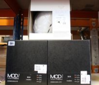 Two Oakley MOD1 helmets (Size M, black and white) and one lady's Roxy Alley Oop helmet (Size M,