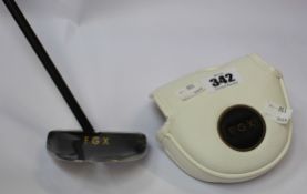 An as new FGX golf putter.