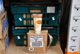 Two crates of Justblond Rapid Repair hair treatment.