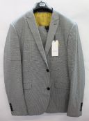 An as new Lindbergh White suit in blue check (Size EU 58 - RRP £190).