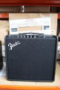 A boxed as new Fender Mustang LT50 guitar amplifier.