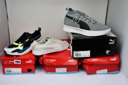 Four pairs of as new Puma trainers; Clyde Court GW (UK 9), X-Ray 2 Square 2 Jr (UK 5) and two