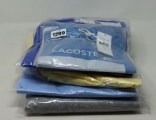 Two as new Lacoste T-shirts (FR 4, 8) Lacoste Polo shirt (FR 7), Lacoste sweater (FR 3) and child'