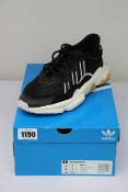 A pair of women's as new Adidas Ozweego trainers (UK 5).