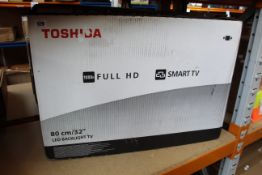 A boxed Toshiba Full HD LED TV 32