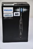 A boxed as new Phillips Sonicare 9000 diamond clean (Some damage to box).