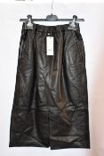 Two as new leather skirts with slit detail (Size 36, 38 - RRP €190).