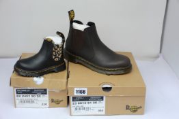 A pair of toddlers as new Dr Martens Leonore boots (UK 6K) and Dr Martens 2976 JNR boots (UK 3).