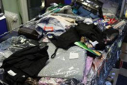 A quantity of as new clothing and related items.