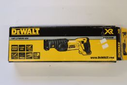 A boxed DeWalt DCS380 18v XR cordless reciprocating saw.