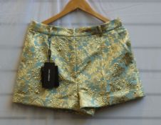 A pair of women's as new Dolce & Gabbana Permanent Collection patterned shorts (Tag/Size 46 - RRP $