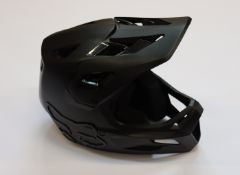 A boxed as new Fox Racing Rampage bike helmet in black (27509-21) (Box damaged).