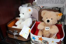 Four as new Steiff Teddy Bears in suitcases - Fynn 28 beige, Fynn 23 beige two Lotte 28 white (