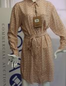 An as new Burberry Monogram print crepe de chine shirt dress (Size 8 RRP £1190).