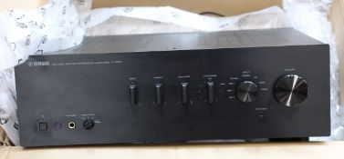 A boxed Yamaha A-S501 integrated amplifier in black.