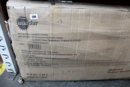 A boxed 4-piece Marylebone Rattan Set.