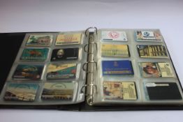 A collection of phone cards in an album.